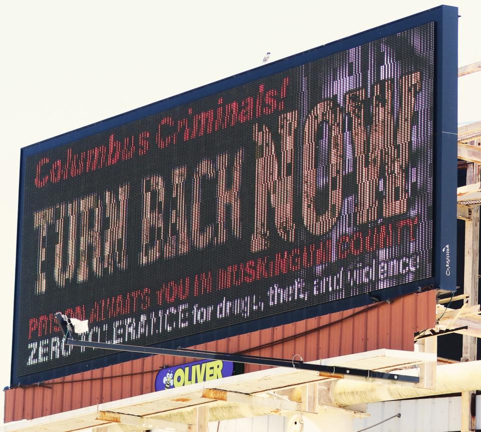 A new billboard warning criminals from Columbus to turn around can be seen at Underwood and Zane streets.