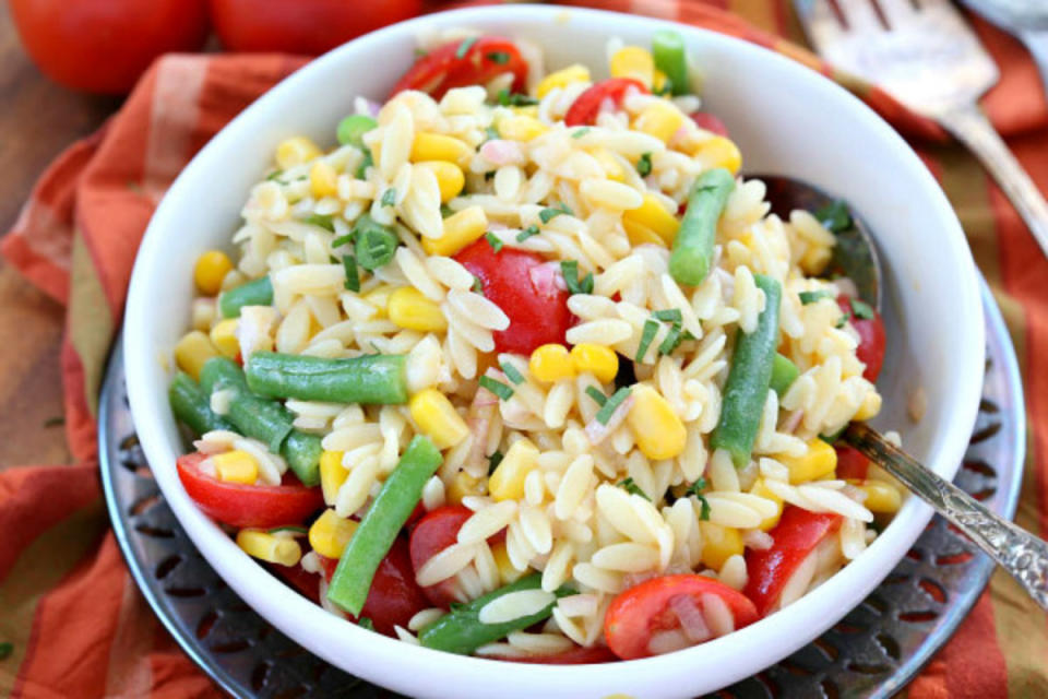 <p>A salad with orzo is a terrific choice for a summer salad.</p><p><strong>Recipe here: </strong><strong><a href="http://www.recipegirl.com/2007/03/29/orzo-salad-with-corn-green-beans-and-tomatoes/" rel="nofollow noopener" target="_blank" data-ylk="slk:Orzo Salad with Corn, Green Beans & Tomatoes;elm:context_link;itc:0;sec:content-canvas" class="link ">Orzo Salad with Corn, Green Beans & Tomatoes</a></strong></p>