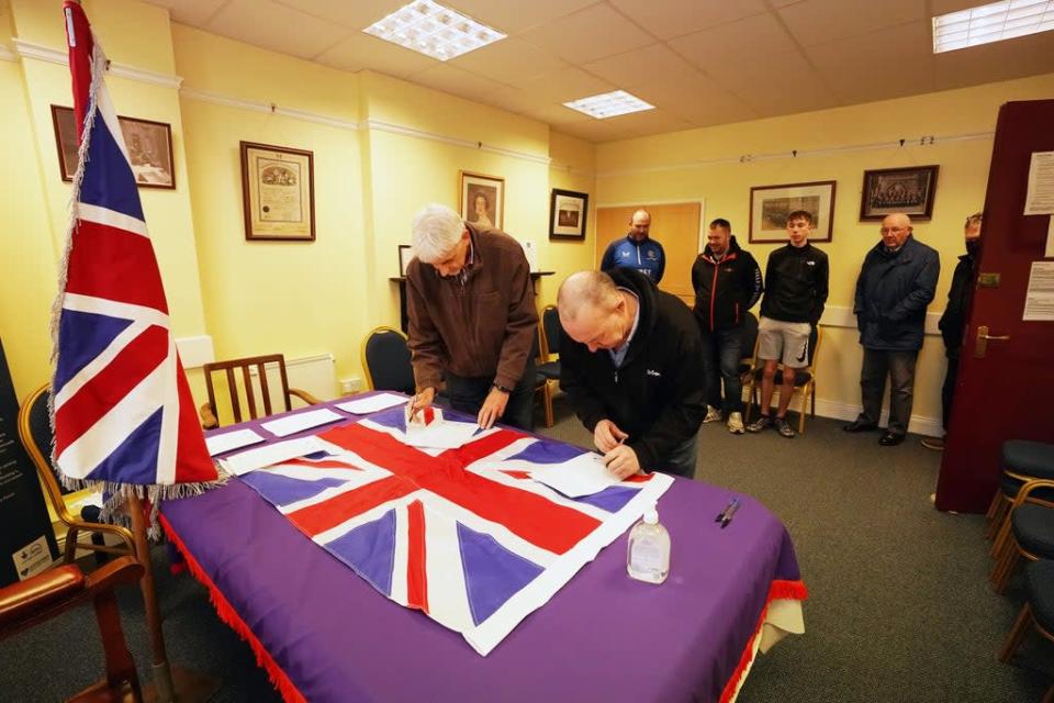 People queue up at Carlton Street Orange Hall in Portadown to sign a declaration in opposition to the Northern Ireland Protocol. (Niall Carson/PA) (PA Wire)