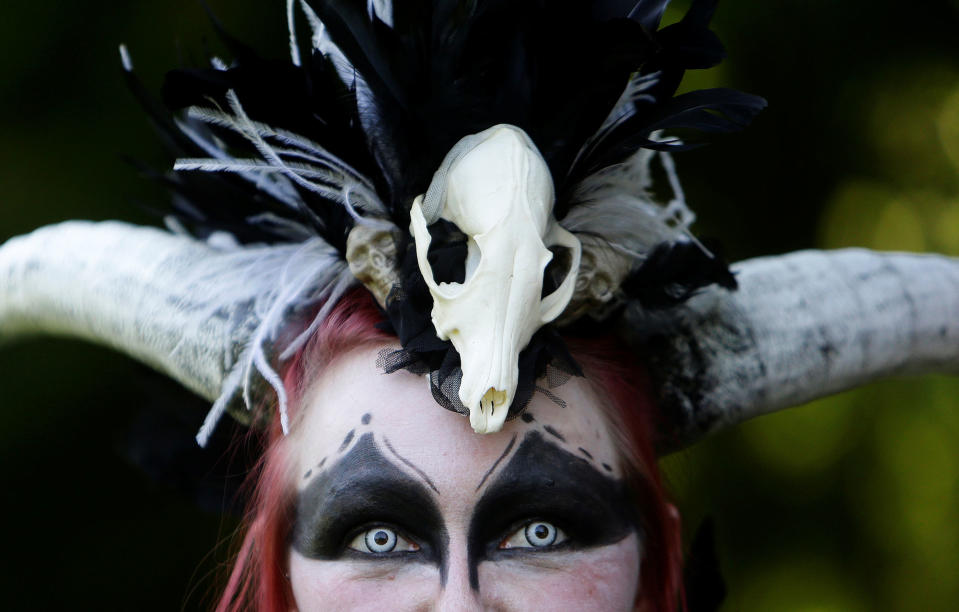 <p>A reveller attends the Victorian picnic during the Wave and Goth festival in Leipzig, Germany, June 2, 2017. (David W Cerny/Reuters) </p>