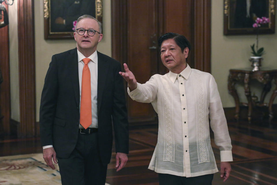 Australia's Prime Minister Anthony Albanese, left, walks beside Philippine President Ferdinand Marcos Jr., during his visit at the Malacanang palace in Manila Friday, Sept. 8, 2023. (Earvin Perias/Pool Photo via AP)