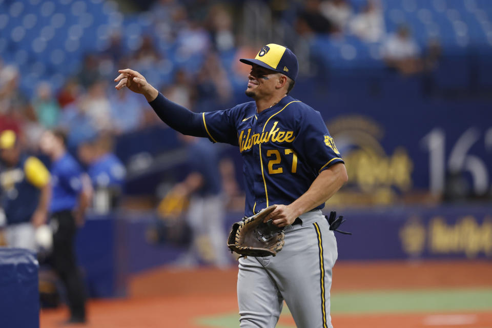 Milwaukee Brewers shortstop Willy Adames heads to the dugout before the team's baseball against the Tampa Bay Rays on Tuesday, June 28, 2022, in St. Petersburg, Fla. (AP Photo/Scott Audette)
