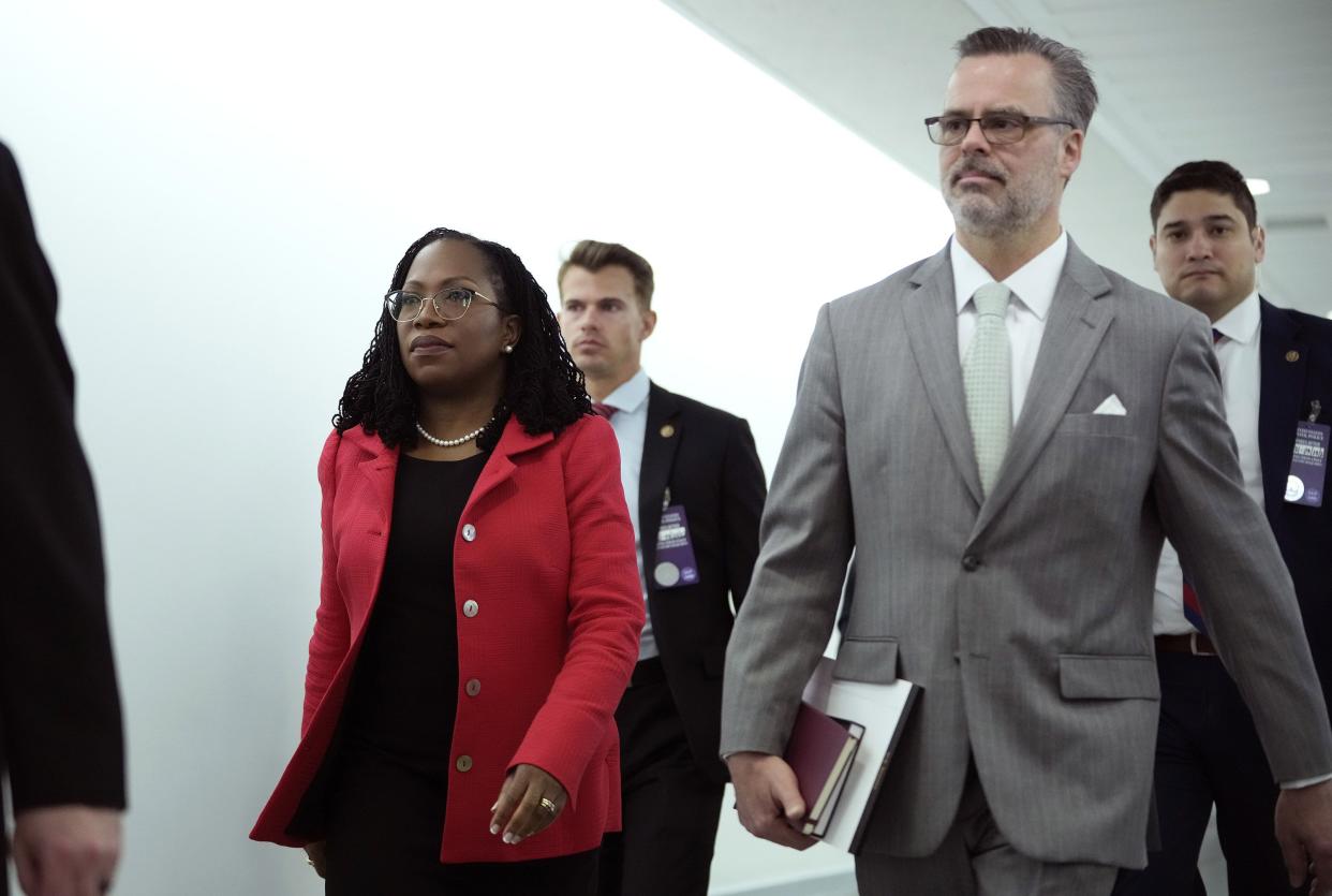 U.S. Supreme Court nominee Judge Ketanji Brown Jackson, followed by her husband Patrick Jackson, arrives for her confirmation hearing before the Senate Judiciary Committee in the Hart Senate Office Building on Capitol Hill March 22, 2022, in Washington, DC. Judge Ketanji Brown Jackson, President Joe Biden’s pick to replace retiring Justice Stephen Breyer on the U.S. Supreme Court, would become the first Black woman to serve on the Supreme Court if confirmed.