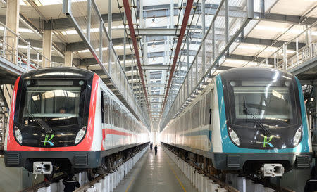 Train cars belonging to the Kunming metro wait to undergo maintenance in Kunming, Yunnan province, April 13, 2016. REUTERS/Brenda Goh