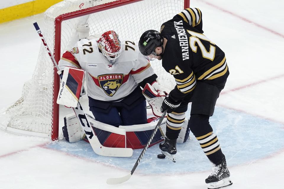 Boston Bruins' James van Riemsdyk (21) tries to get the puck past Florida Panthers' Sergei Bobrovsky (72) during the second period in Game 3 of an NHL hockey Stanley Cup second-round playoff series Friday, May 10, 2024, in Boston. (AP Photo/Michael Dwyer)