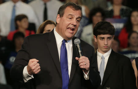 Chris Christie formally announces his campaign for the 2016 Republican presidential nomination as his son Patrick looks on during a kickoff rally at Livingston High School in Livingston, New Jersey, June 30, 2015. REUTERS/Brendan McDermid