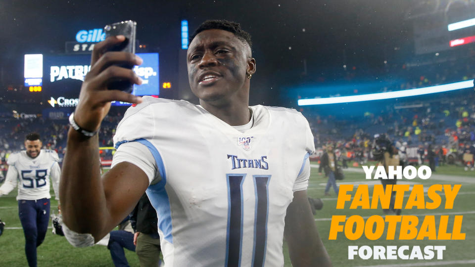 Tennessee Titans wide receiver A.J. Brown on his phone after a game. (Photo by Elsa/Getty Images)