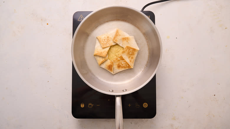 browned crunchwrap in skillet