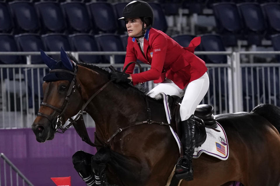 United States' Jessica Springsteen, riding Don Juan van de Donkhoeve, competes during the equestrian jumping team final at Equestrian Park in Tokyo at the 2020 Summer Olympics, Saturday, Aug. 7, 2021, in Tokyo, Japan. (AP Photo/Carolyn Kaster)