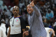 NBA referee Tom Washington listens to Philadelphia 76ers head coach Doc Rivers during the first half of Game 2 of an NBA basketball second-round playoff series, Wednesday, May 4, 2022, in Miami. (AP Photo/Marta Lavandier)