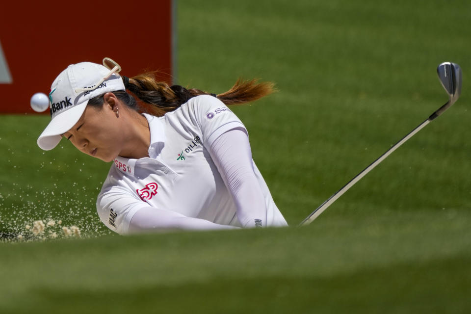 Australia's Minjee Lee plays from a bunker on the first hole during the second round of the Australian Open Golf Championship in Sydney, Australia, Friday, Dec. 1, 2023. (AP Photo/Mark Baker)