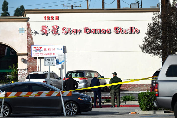 Investigators work at the scene of a mass shooting in Monterey Park (Robyn Beck / AFP via Getty Images)