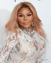 <p><strong>Lil Kim's</strong> peach-toned locks are dreamy. Her hair weaves peach and blonde together seamlessly, resulting in a beautiful peach <a href="https://www.goodhousekeeping.com/beauty/hair/g3279/balayage-hair-color/" rel="nofollow noopener" target="_blank" data-ylk="slk:balayage;elm:context_link;itc:0;sec:content-canvas" class="link ">balayage</a>, proving that peach color looks amazing on darker skin. </p>