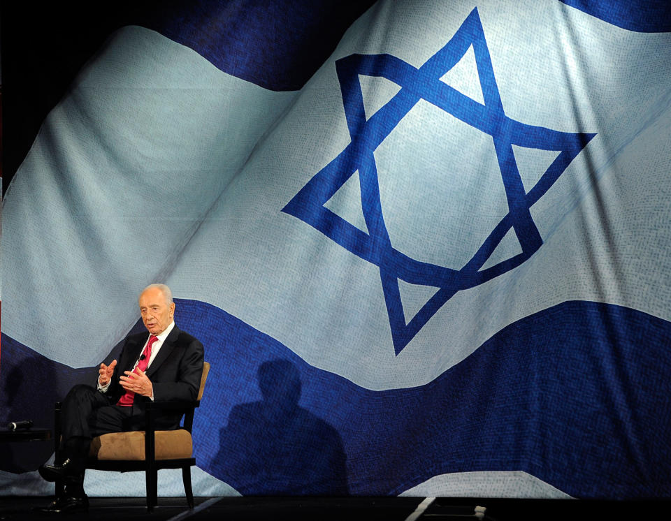 <p>Israeli President Shimon Peres takes part in an onstage discussion with journalist Campbell Brown at the Beverly Hilton Hotel, Thursday, March 8, 2012, in Beverly Hills, Calif. (AP Photo/Chris Pizzello) </p>