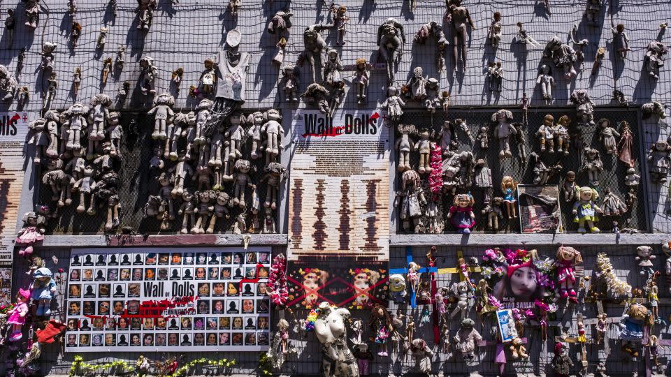 The Wall of the Dolls, il Muro delle Bambole, is an art installation in Milan that raises awareness of violence against women. - Frank Bienewald/LightRocket/Getty Images