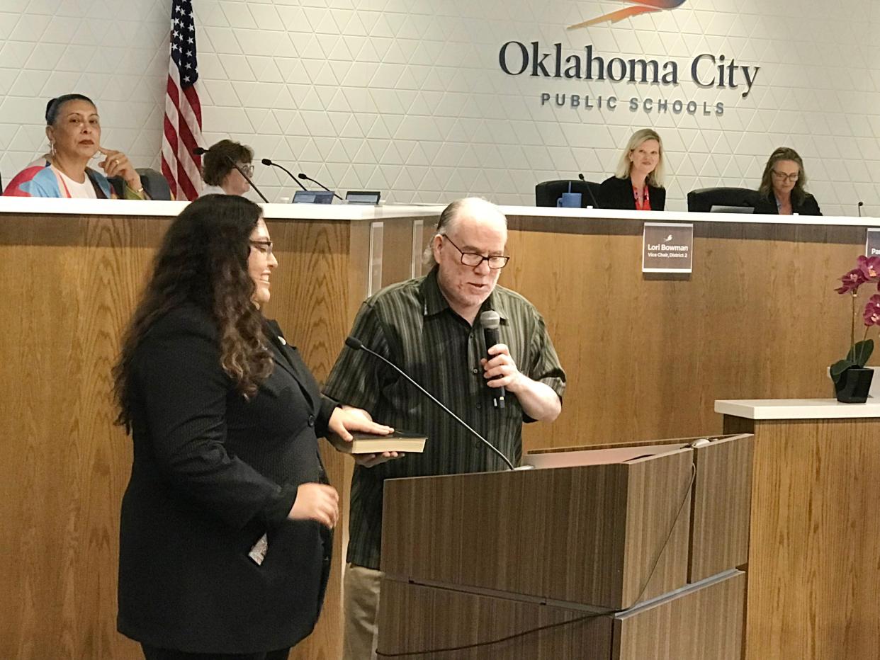 During the Oklahoma City Board of Education meeting, new member Jessica Cifuentes takes the oath of office, which was administered by OKCPS Board Clerk Craig Cates.