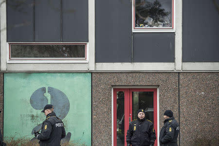 Danish police, in cooperation with the Police Intelligence Department, search an apartment block in Ishoej, south of Copenhagen, Denmark April 7, 2016. REUTERS/Asger Ladefoged/Scanpix Denmark