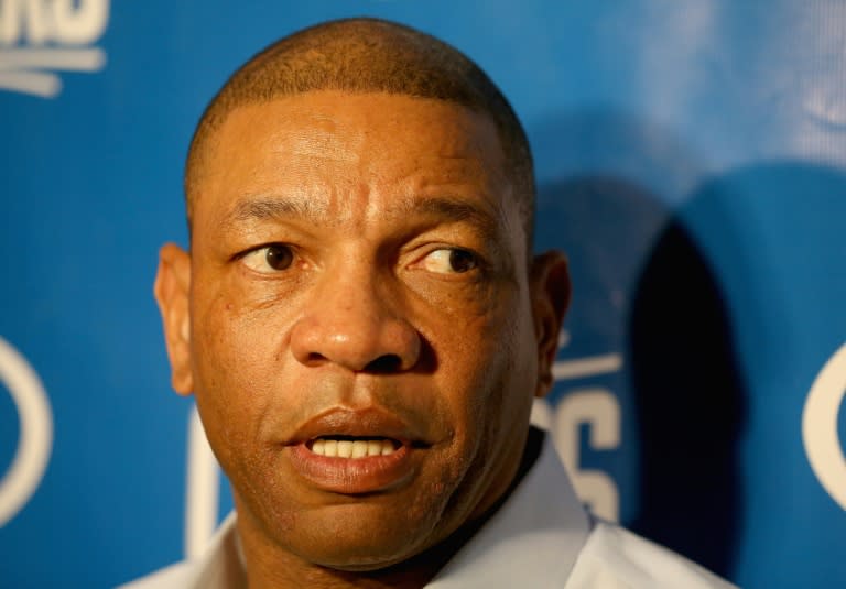 Doc Rivers, head coach of the Los Angeles Clippers, talks to the media explaining the injury to Blake Griffin, before their NBA game against the Indiana Pacers at Bankers Life Fieldhouse in Indianapolis, Indiana, on January 26, 2016