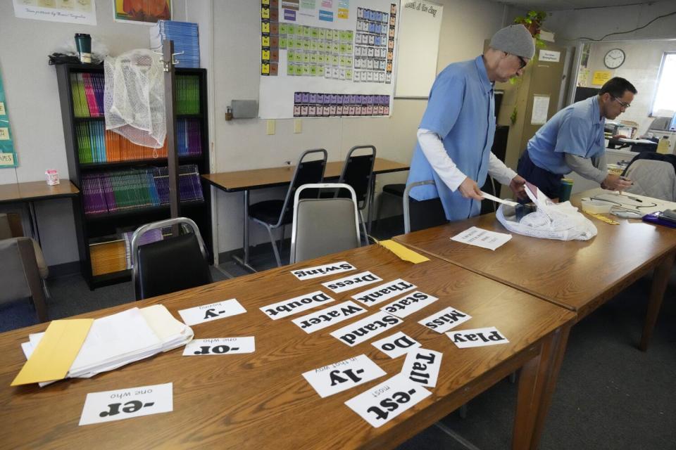 Michael Moore and Steven Joyner in a classroom setting