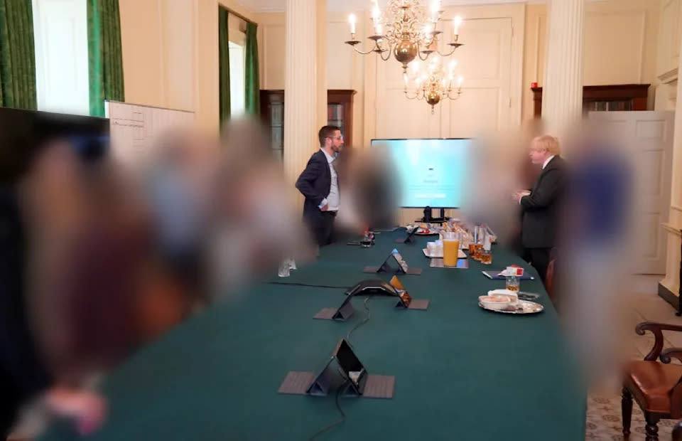 Boris Johnson alongside Simon Case and No 10 staffers surrounded by food and drink on 19 June, 2020. (Cabinet Office)
