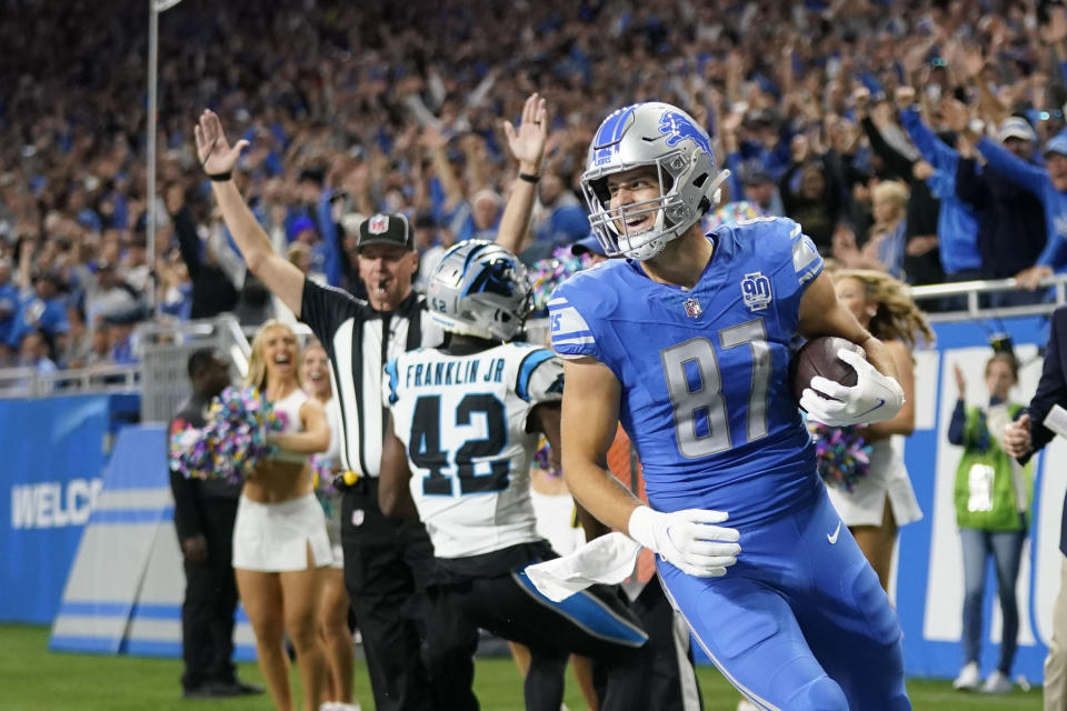 Detroit Lions tight end Sam LaPorta (87) reacts after his touchdown in the first half of an NFL football game against the Carolina Panthers in Detroit, Sunday, Oct. 8, 2023. (AP Photo/Paul Sancya)
