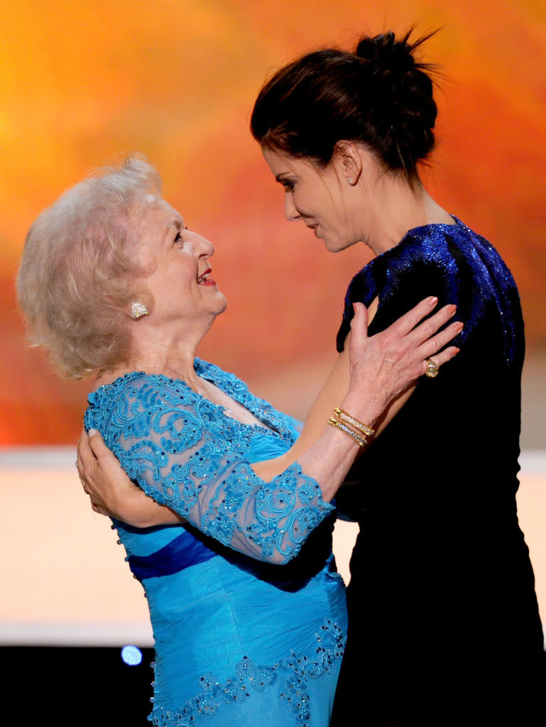 Sandra Bullock presents Betty White with the Life Achievement Award at the 16th Annual Screen Actors Guild Awards at the Shrine Auditorium in Los Angeles on Jan. 23, 2010. (Photo: Kevin Winter/Getty Images)
