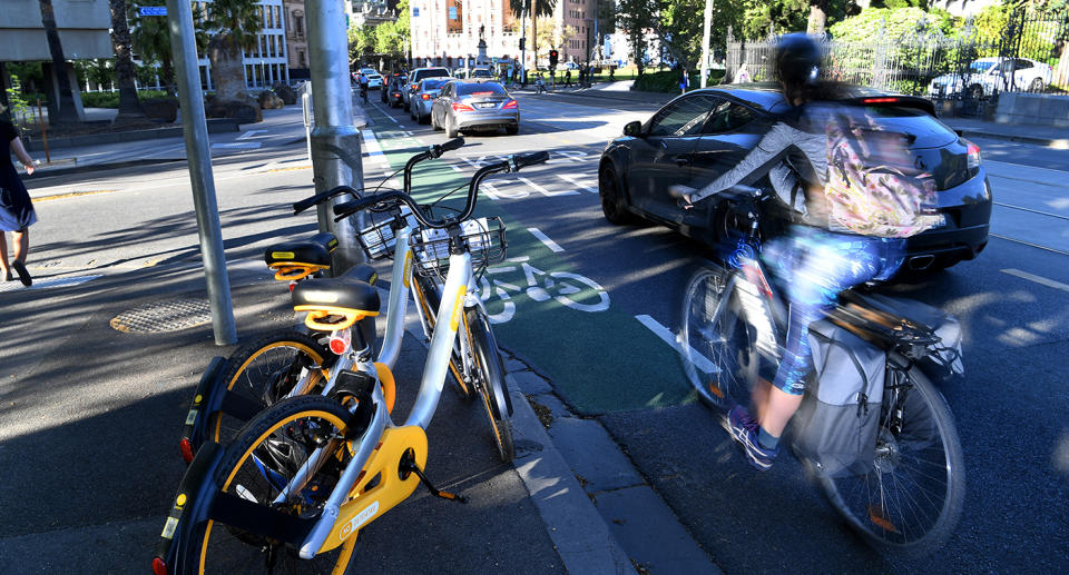 Two oBikes on a footpath in Melbourne’s CBD. Source: AAP