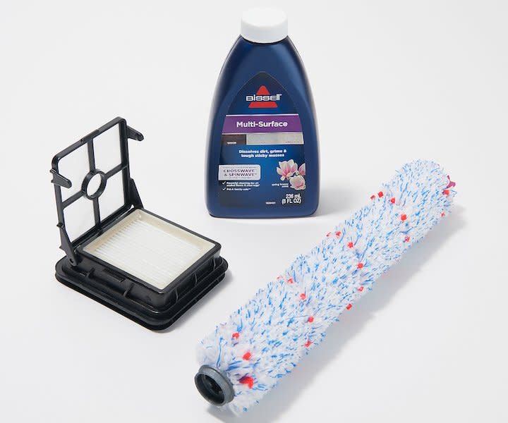Get a dual-action brush roll, storage tray, and an 8-oz bottle of multi-surface cleaner with the Bissell Crosswave. (Photo: QVC)
