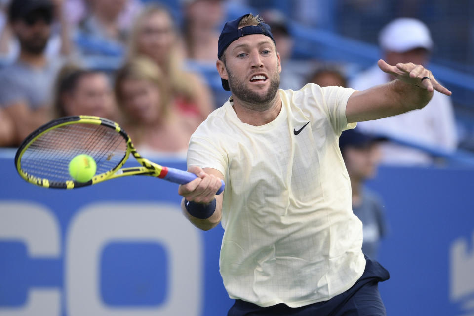 Jack Sock, of the United States, hits a forehand to Rafael Nadal, of Spain, at the Citi Open tennis tournament Wednesday, Aug. 4, 2021, in Washington. (AP Photo/Nick Wass)