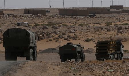 Russian trucks seen on the road heading to Deir al-Zor in Kabakeb near Deir al-Zor, Syria September 21, 2017. REUTERS/Omar Sanadiki