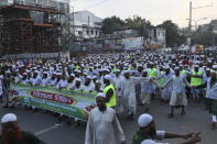 Muslims participate in a protest over an alleged insult to Islam, outside the country’s main Baitul Mukarram Mosque in Dhaka, Bangladesh, Saturday, Oct. 16, 2021. Thousands of Muslims protested in Bangladesh’s capital on Saturday for what they perceived as an image insulting Islam that had gone viral over social media. About 10,000 Muslims joined a peaceful protest under the banner of Islami Andolon Bangladesh as they took to the streets outside the country’s main Baitul Mukarram Mosque in downtown Dhaka. (AP Photo/Abdul Goni)