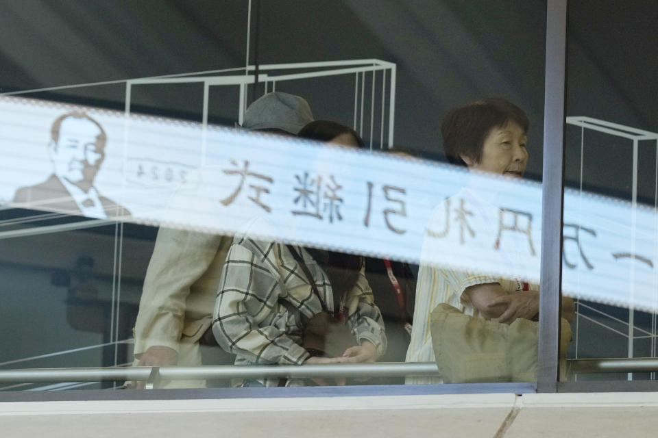 Visitors look at the "10,000 Yen Bill Handover Ceremony" at Tokyo Stock Exchange Wednesday, July 3, 2024, in Tokyo. New 10000 yen bill featuring a portrait of Eiichi Shibusawa, the "father of Japanese capitalism."(AP Photo/Eugene Hoshiko)