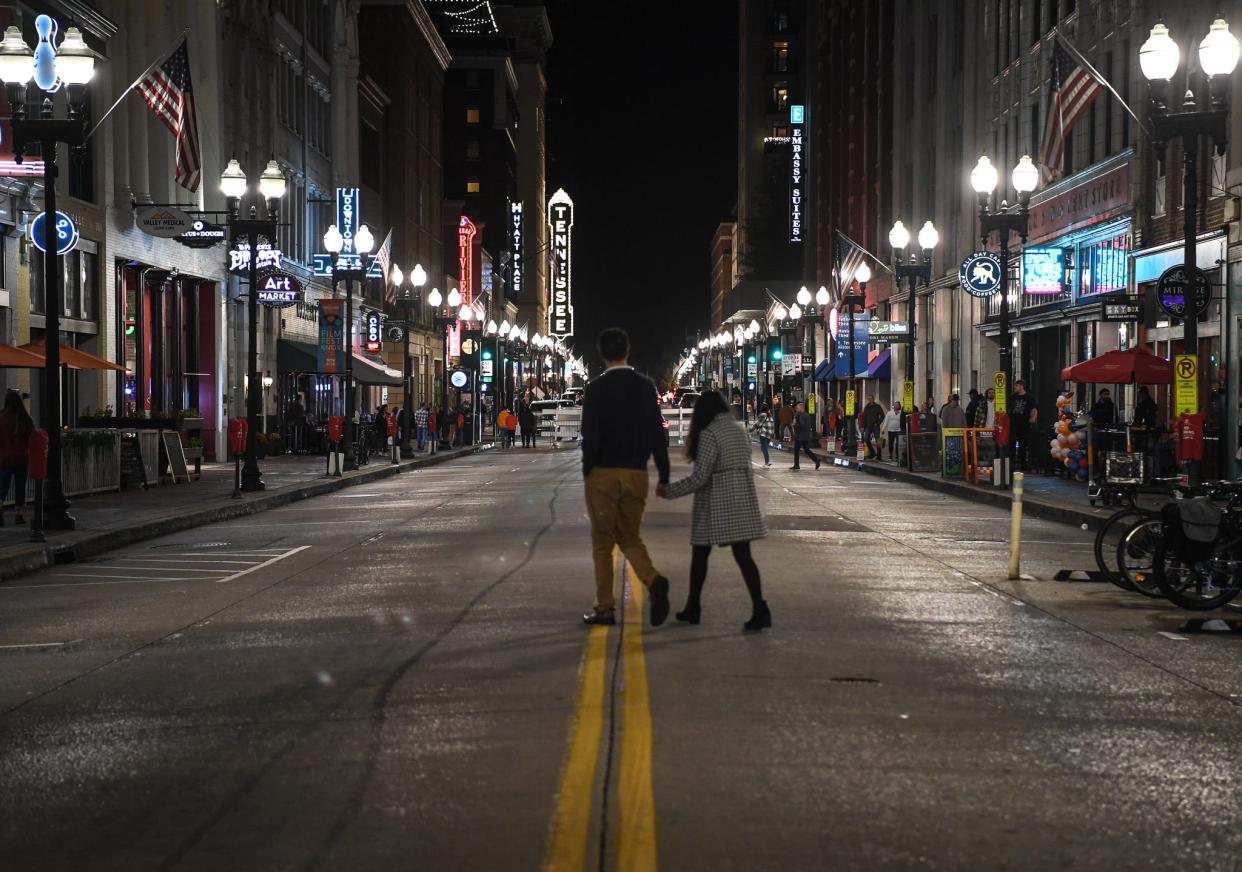 Knoxville residents and visitors enjoy a vehicle-free Gay Street on Nov. 11 during the first of four weekend trial runs by the city, which is testing a pedestrian-only zone in the 400 block. "We hope this experiment will yield a variety of benefits for residents, visitors and businesses – as people are free to roam down one of the city’s most iconic corridors unencumbered.," city COO Grant Rosenberg told Knox News via email.