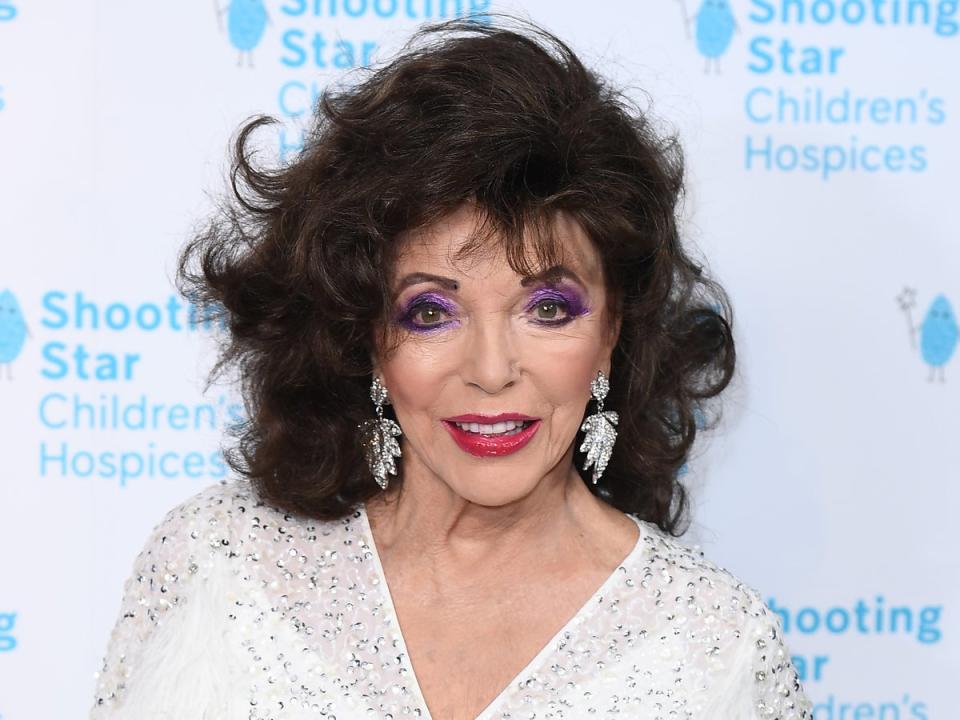 Joan Collins said that King Charles was ‘charming’ when he presented her damehood (Getty Images)