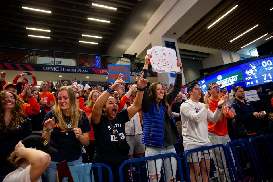 Hope fans celerate the Hope women's 71-58 win over UW Whitewater for the national title Saturday, March 19, 2022, at UPMC Cooper Fieldhouse in Pittsburgh. 