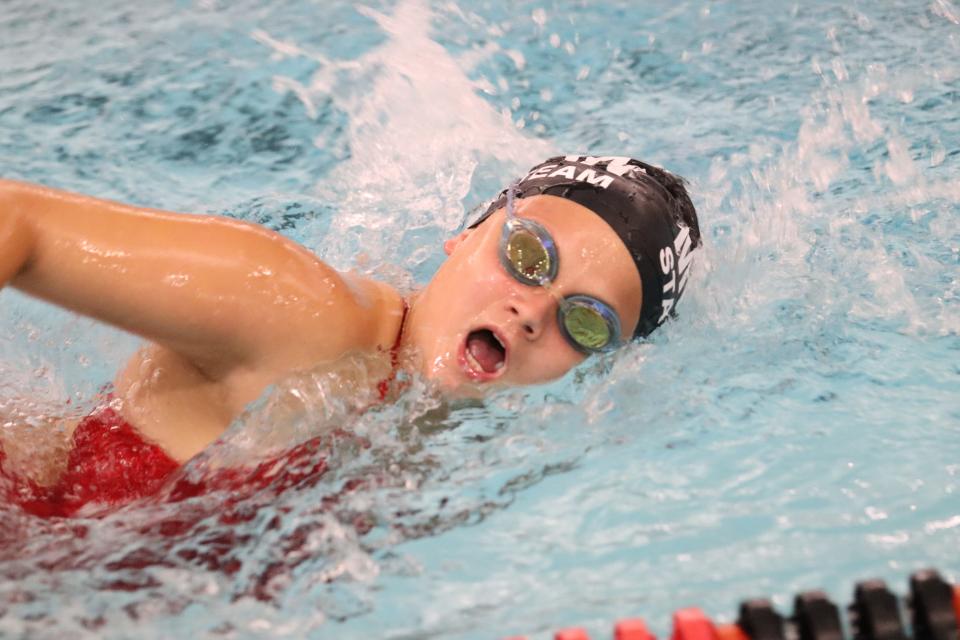 Lily Rader swims for Milan during a 110-64 win over St. Mary Catholic Central Tuesday night.