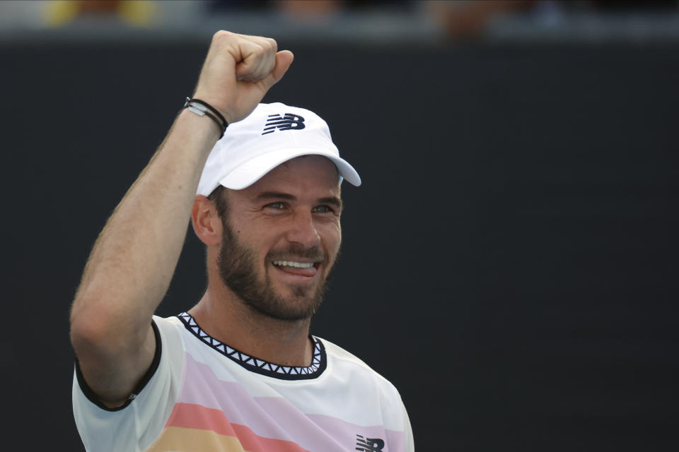 Tommy Paul of the U.S. celebrates after defeating compatriot Jenson Brooksby in their third round match at the Australian Open tennis championship in Melbourne, Australia, Saturday, Jan. 21, 2023. (AP Photo/Asanka Brendon Ratnayake)