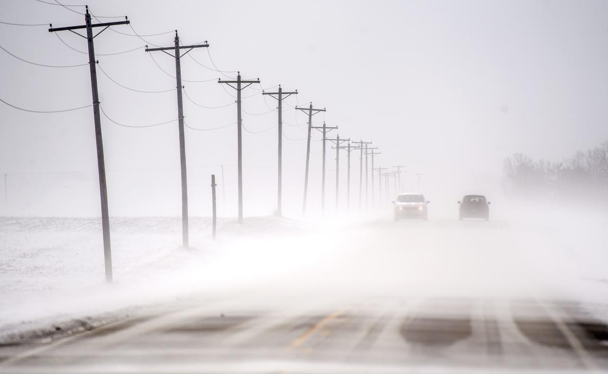 Wind-driven snow rolls over Dee-Mack Road, obscuring visibility on Jan. 5, 2022, between Washington and Eureka.