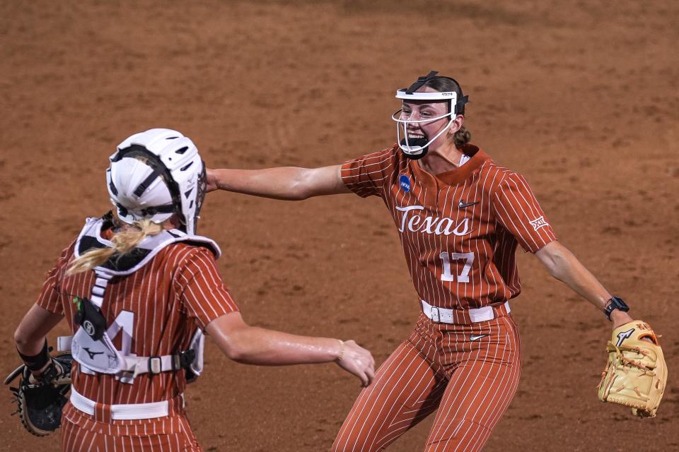 Texas Longhorns pitcher Teagan Kavan, right, runs to catcher Reese Atwood after the final strikeout in the 6-5 win over Texas A&M in Game 3 of the NCAA super regional at McCombs Field on Sunday.