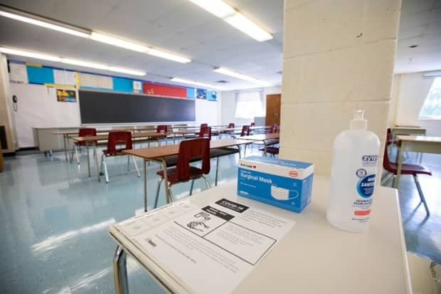 More than 25 COVID cases have been reported within public and Catholic school divisions in Regina and Saskatoon since Sunday. (Carlos Osorio/The Canadian Press - image credit)