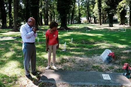 Desendants of William Tucker gather at the Tucker family cemetery in Hampton, Virginia