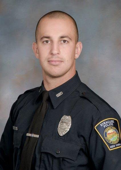 Syracuse Police Officer Michael Jensen was killed Sunday night in a shootout with a gunman outside at a house in Liverpool, N.Y. Photo courtesy of Syracuse Police Department/Facebook