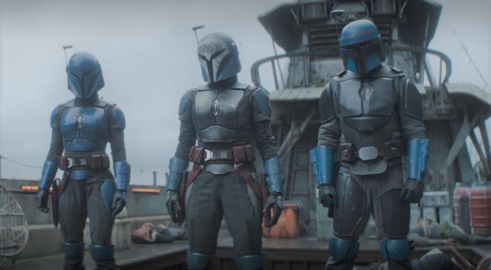 Mandalorian Nite Owls stand on a water ship on The Mandalorian