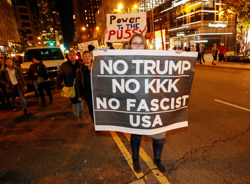 Protesters walk during a protest against Republican president-elect Donald Trump in Chicago