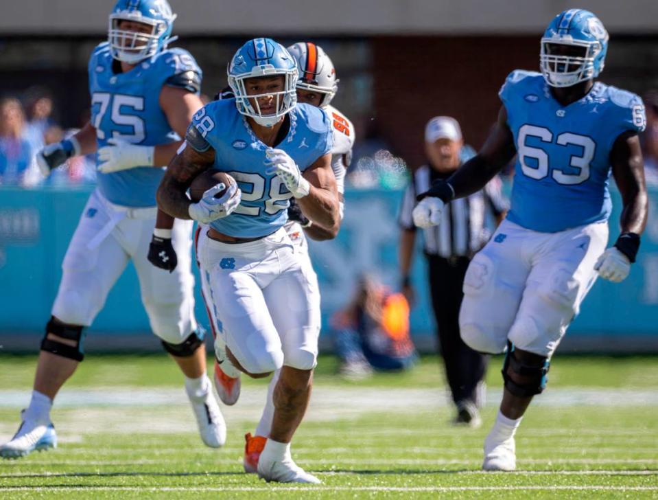 North Carolina’s Omarion Hampton (28) breaks open for a 54-yard touchdown run in the second quarter, giving the Tar Heels’ a 14-7 lead over Campbell in the second quarter on Saturday, November 4. 2023 at Kenan Stadium in Chapel Hill, N.C.