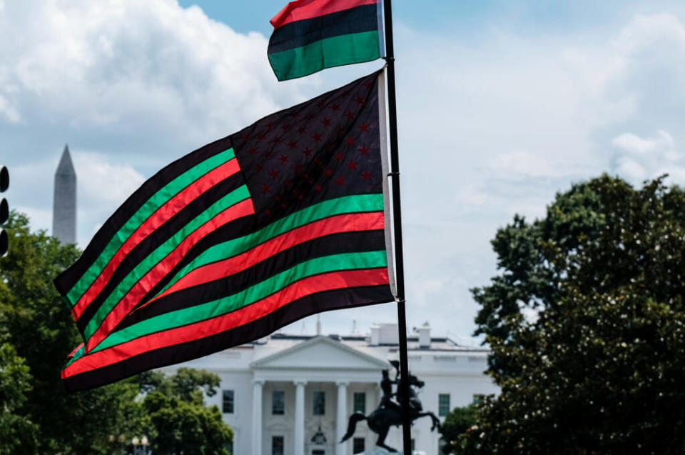 A Pan-African flag flies from Black Lives Matter Plaza overlooking the White House on Juneteenth to mark the liberation of slavery in 1865 on June 19, 2020, in Washington, D.C. (Photo by Michael A. McCoy/Getty Images)