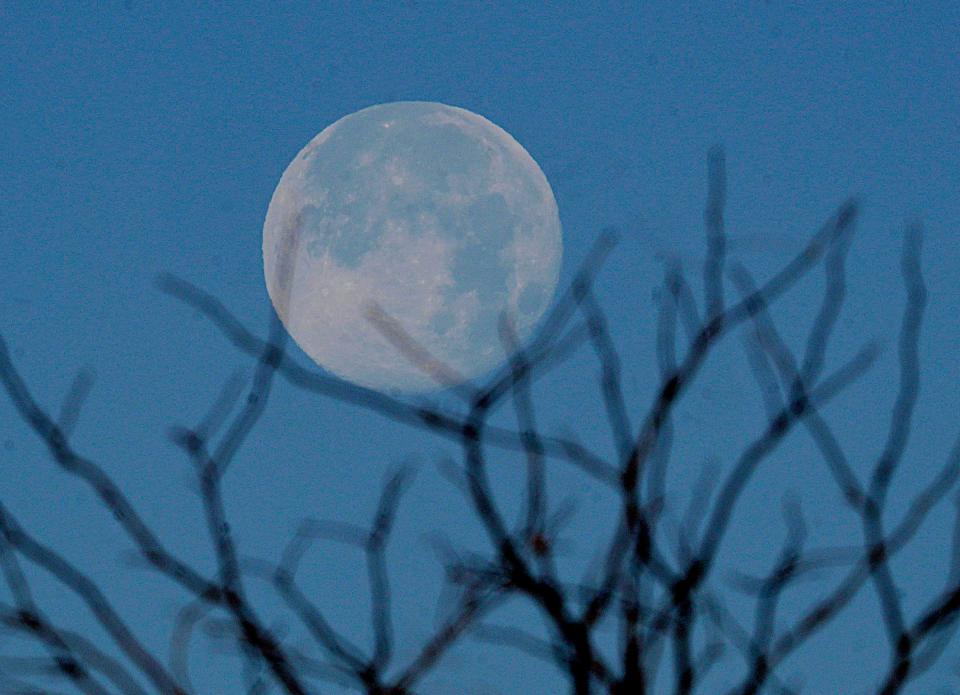 The nearly-full beaver moon set over Glendale on Nov. 28, 2023. The most recent full moon, also called the cold moon, was Dec. 26.