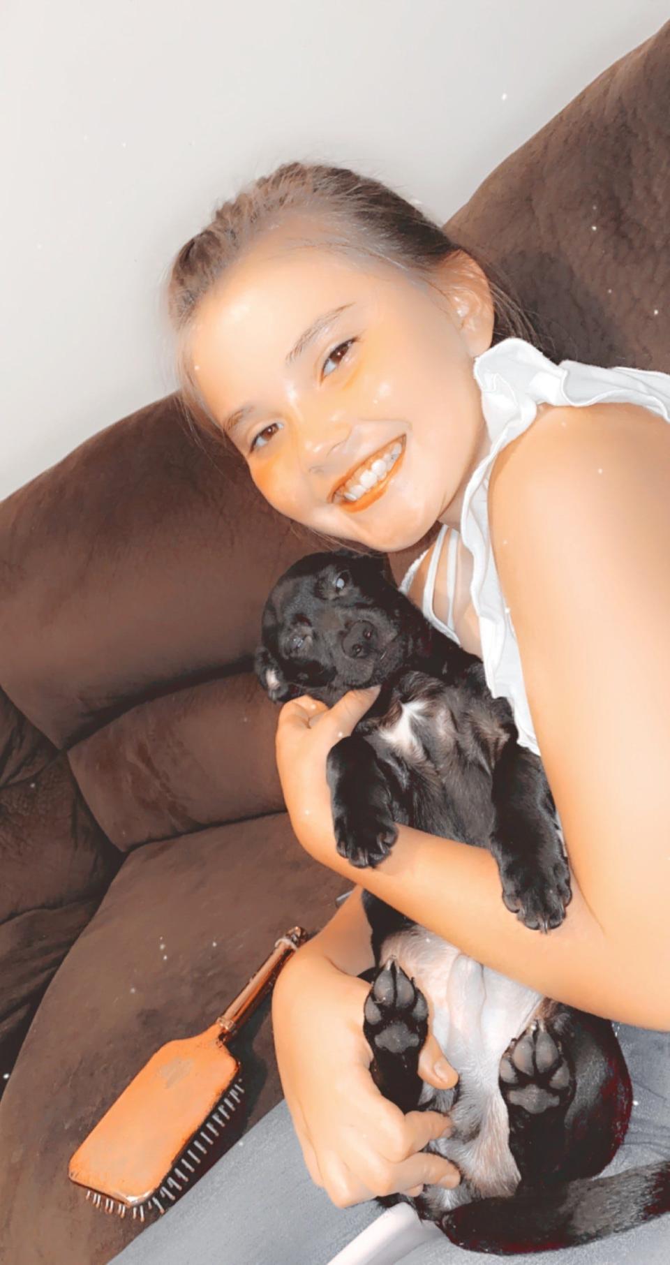 Katelynn Elizabeth Simonds and her dog, 'Little Man'