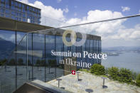 The logo of the peace summit is pictured in Buergenstock, Switzerland, Thursday, June 13, 2024. A Ukraine peace simmit with over 90 delegations from all over the world will take place at the Buergenstock Resort on Saturday, June 15 and Sunday, June 16, 2024. (Urs Flueeler/Keystone via AP)