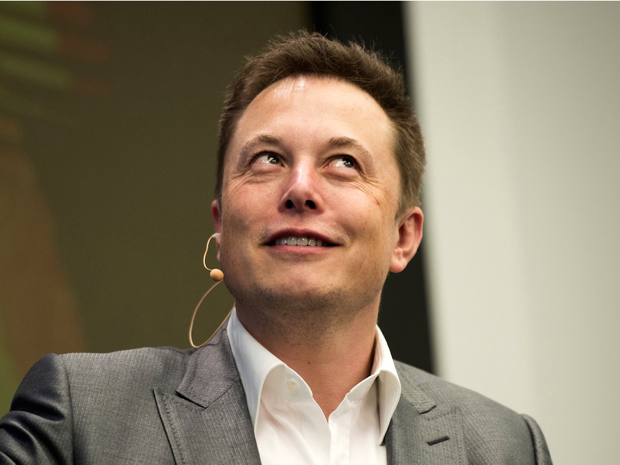 elon smaller smiling